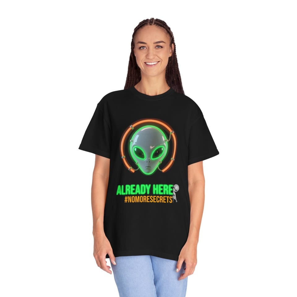 Already Here Neon Grey Tee, front view (Printify product mockup, on a model)