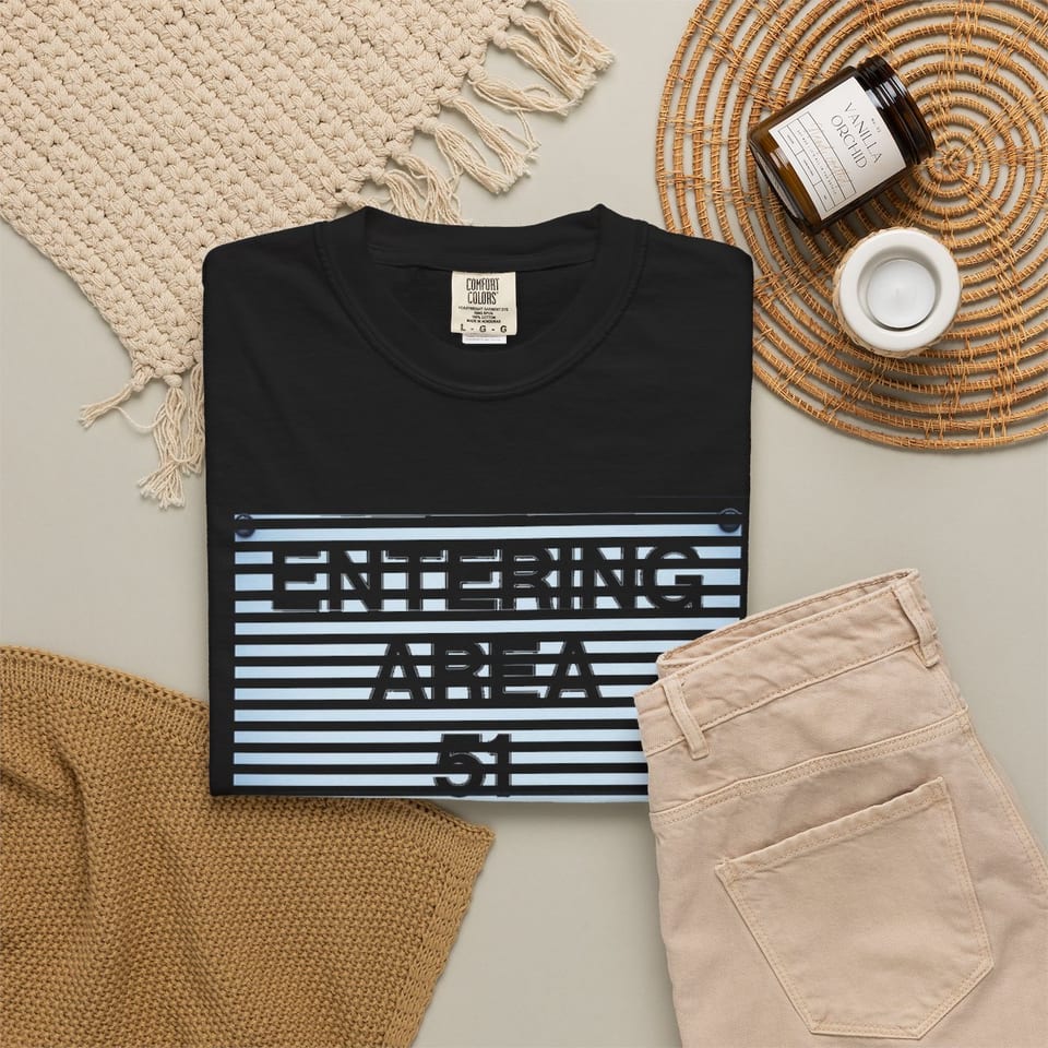 Area 51 Black Triangle Tee, folded 2 view (Printify product mockup)