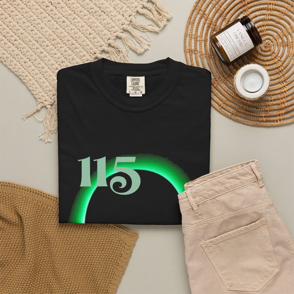 Element 115 Glowing Alien Grey Tee, folded 2 view (Printify product mockup)