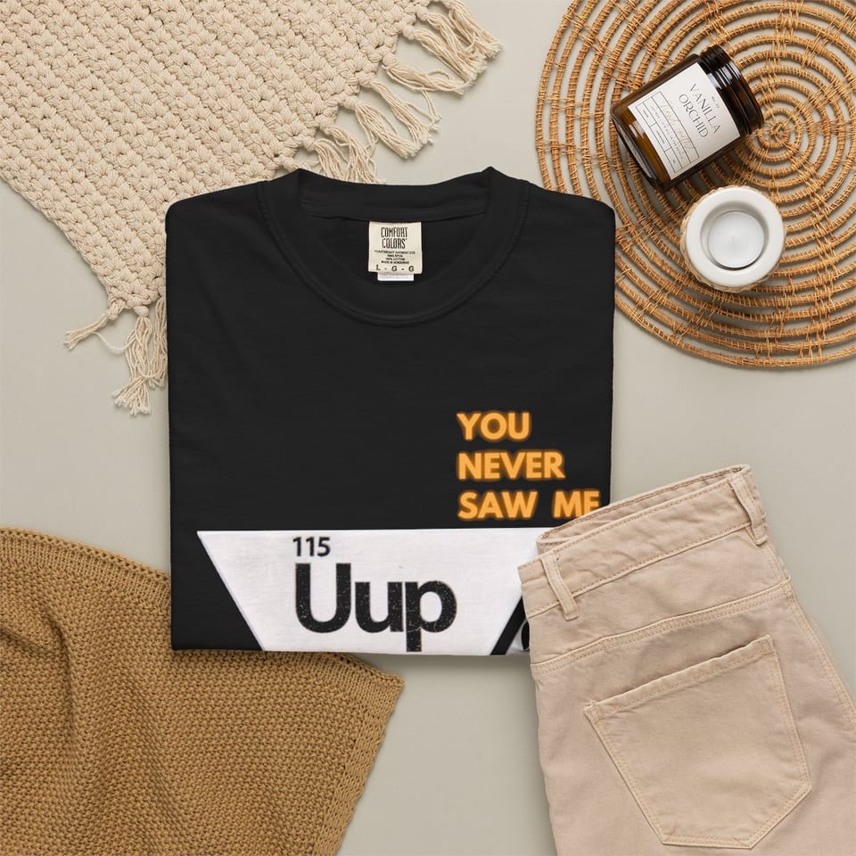 Uup 115 "You Never Saw Me" Tee, folded 2 view (Printify product mockup)