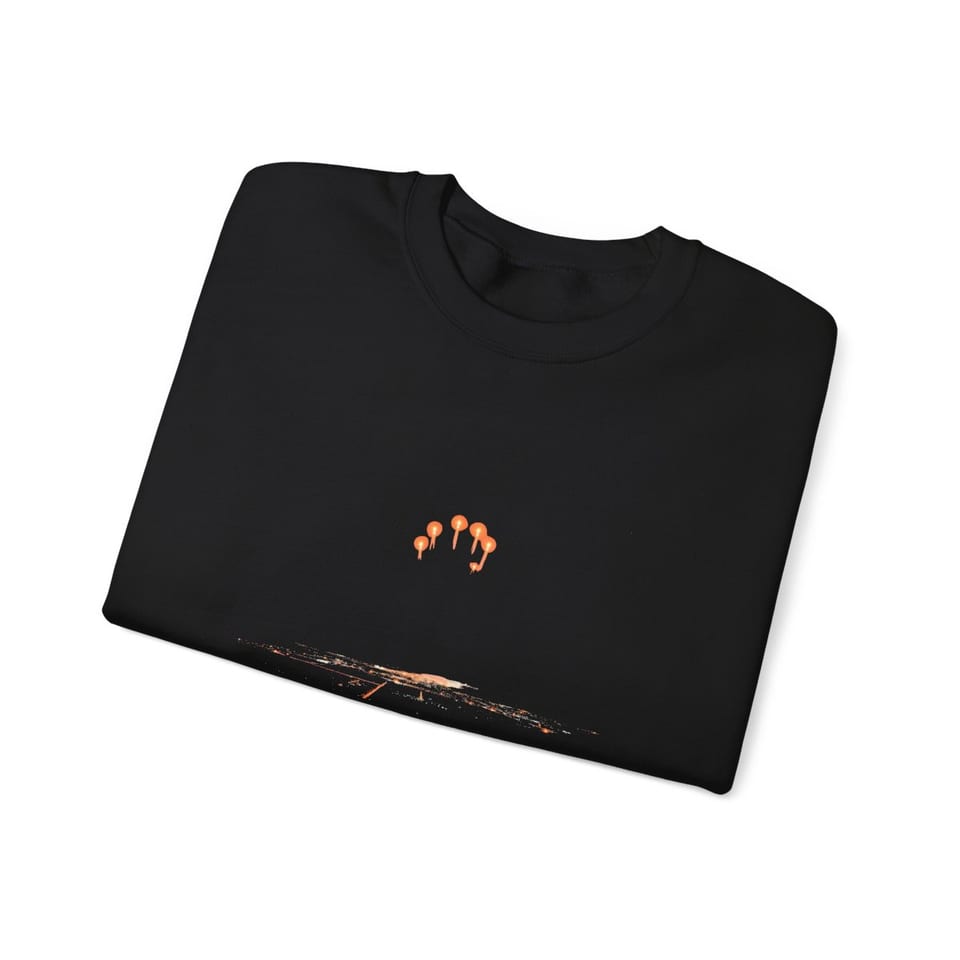 Lights Over the Desert 1997 Crewneck Sweatshirt, folded view (Printify product mockup)