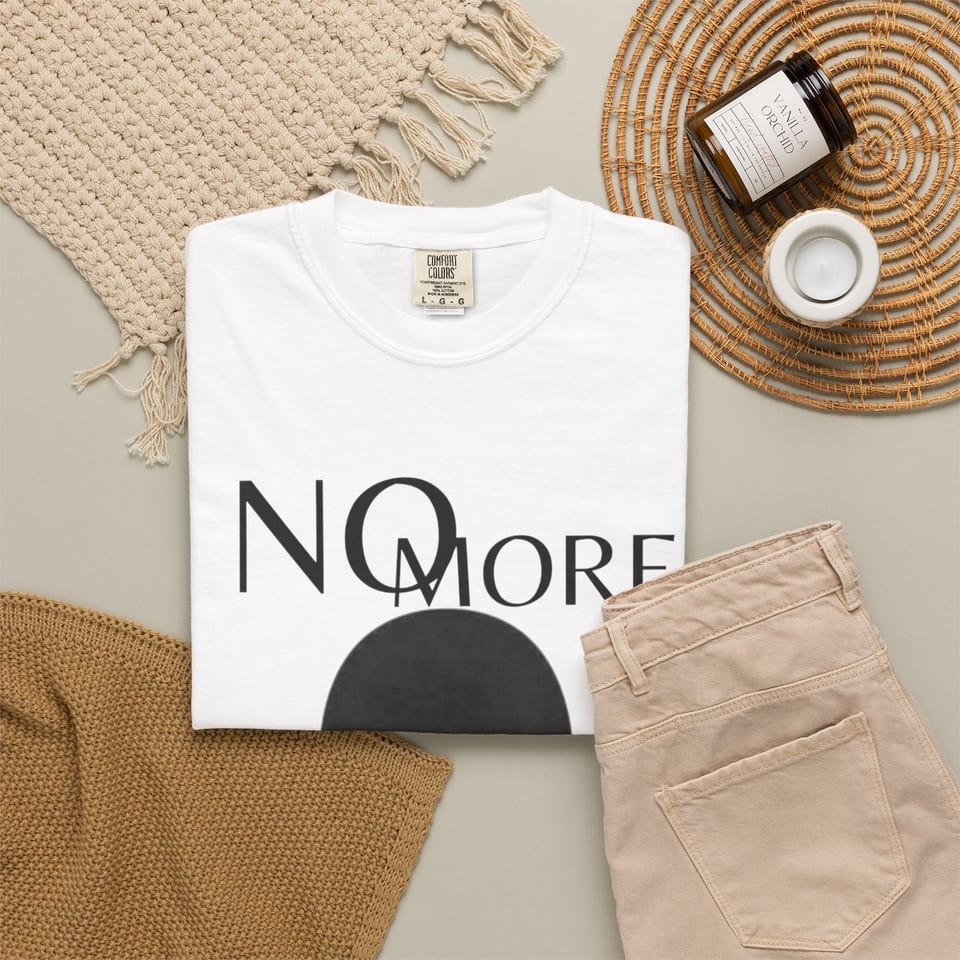 No More Secrets Alien Face Tee, folded 2 view (Printify product mockup)