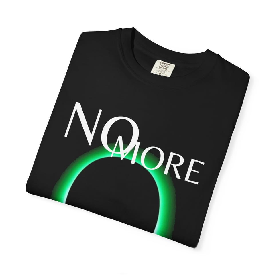 No More Secrets Green Glow Alien Face Tee, folded view (Printify product mockup)