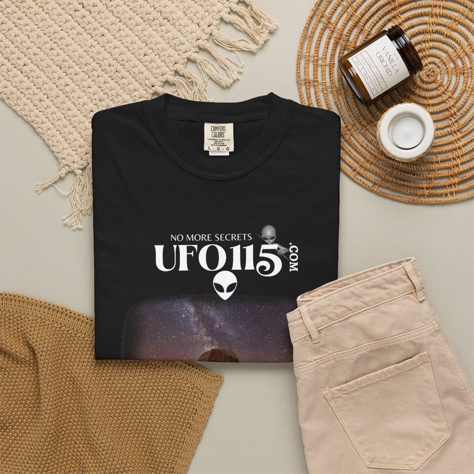 Sphinx and Sky Tee, folded 2 view (Printify product mockup)