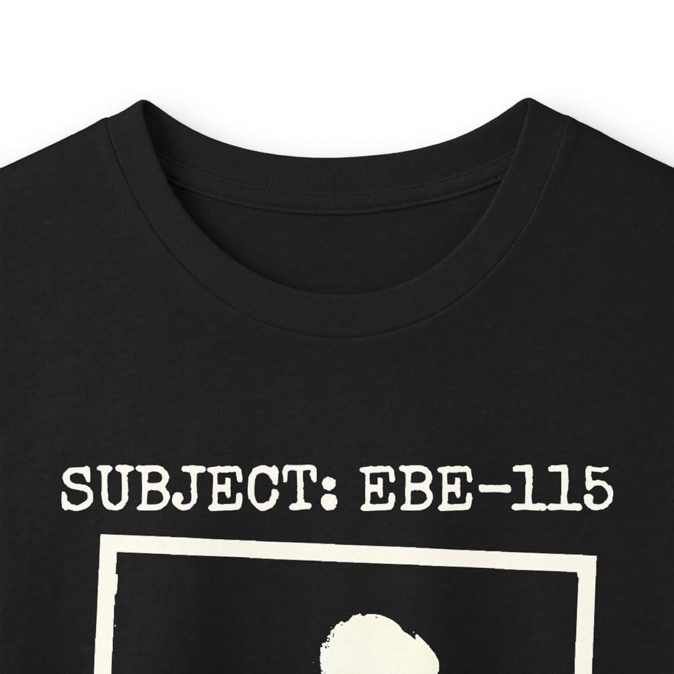 Subject EBE-115 Classified Long Sleeve Tee, collar closeup view (Printify product mockup)