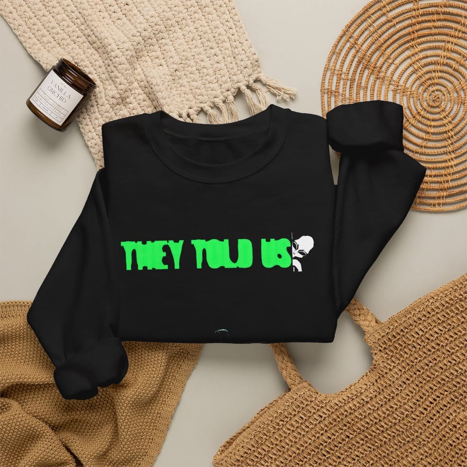 They Told Us Crewneck Sweatshirt, folded 2 view (Printify product mockup)