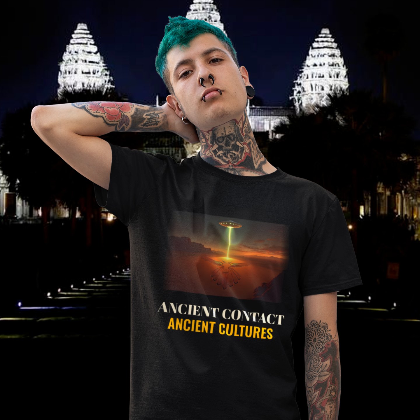 Ancient Contact Desert Lines T-shirt in Black, front print, worn by a model (temple at night). AI-edited photo: the real print artwork was digitally placed on a model photo.