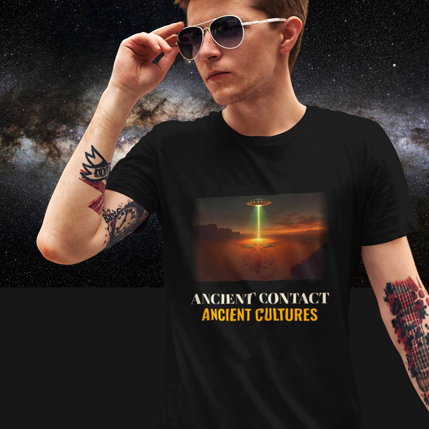 Ancient Contact Desert Lines T-shirt in Black, front print, worn by a model (Milky Way night). AI-edited photo: the real print artwork was digitally placed on a model photo.