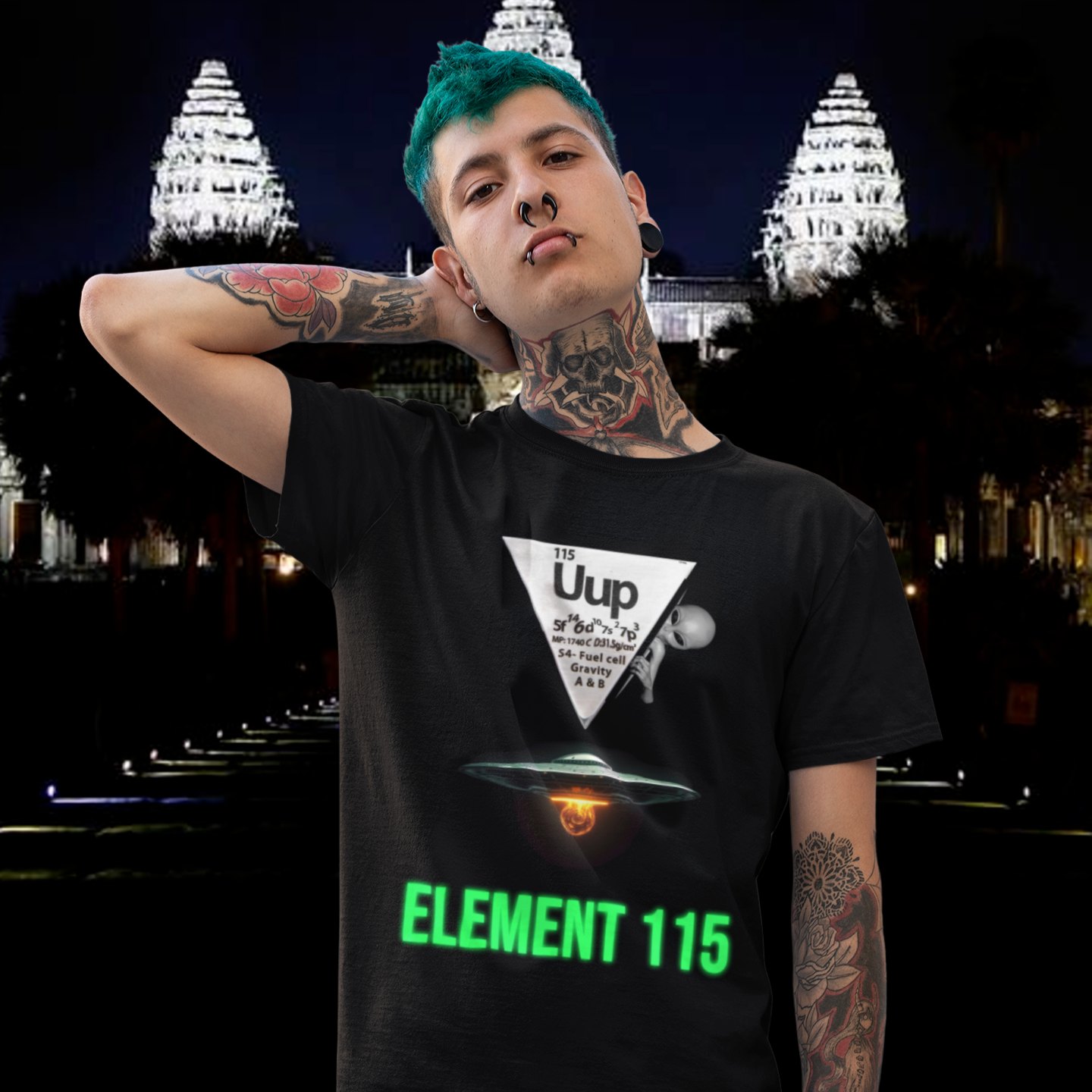 Element 115 Fuel Cell T-shirt in Black, front print, worn by a model (temple at night). AI-edited photo: the real print artwork was digitally placed on a model photo.
