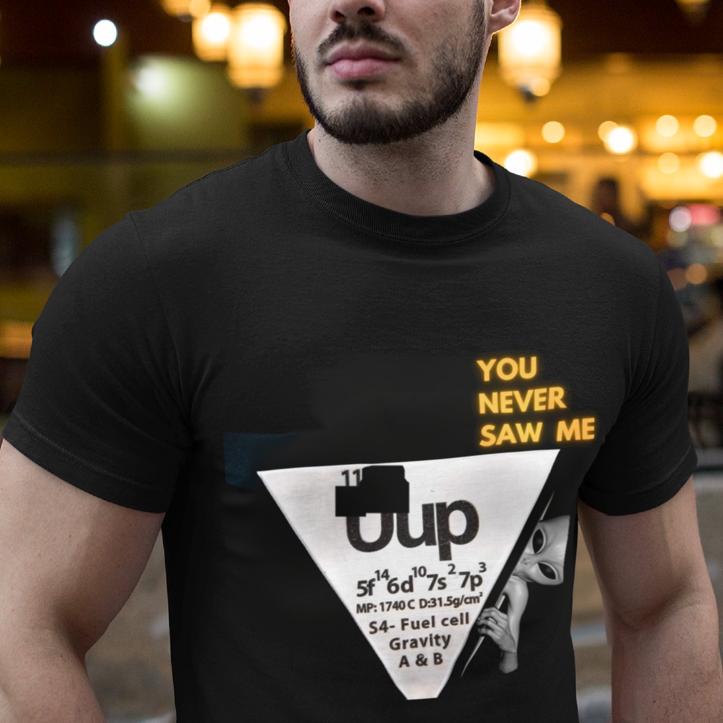Element 115 – Uup You Never Saw Me T-shirt in Black, front print, worn by a model (bar lights, evening). AI-edited photo: the real print artwork was digitally placed on a model photo.
