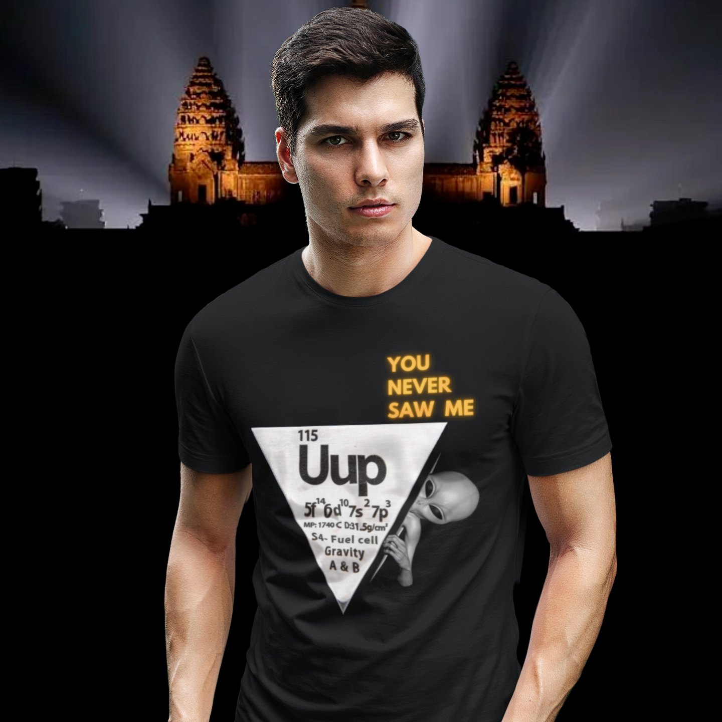 Element 115 – Uup You Never Saw Me T-shirt in Black, front print, worn by a model (Angkor temple light beams). AI-edited photo: the real print artwork was digitally placed on a model photo.