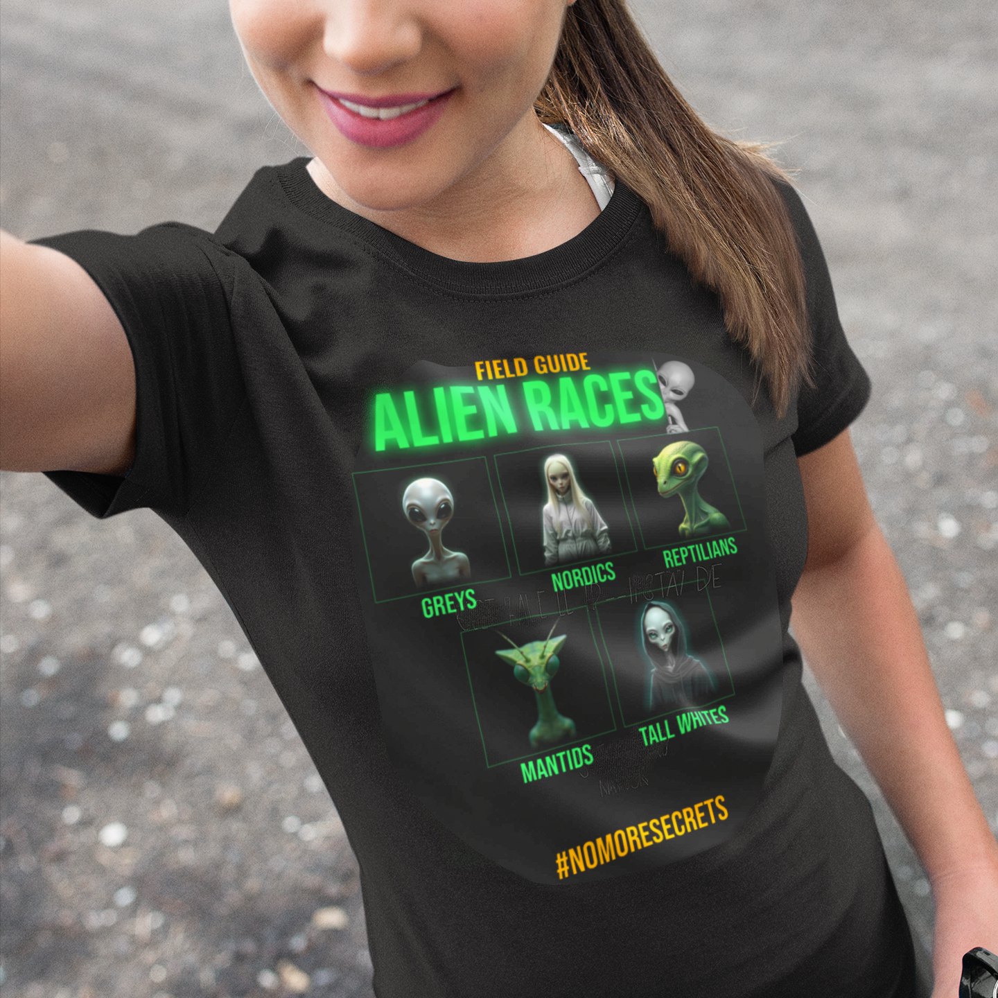 Field Guide to Alien Races T-shirt in Black, front print, worn by a model (outdoor selfie, day). AI-edited photo: the real print artwork was digitally placed on a model photo.
