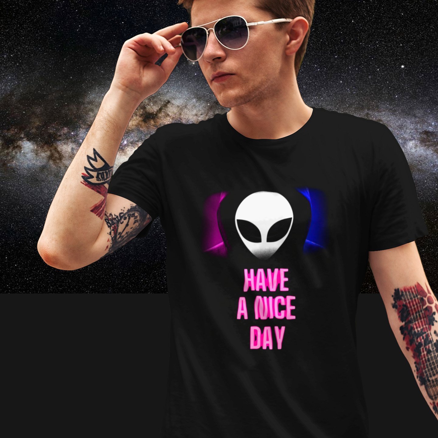 Have a Nice Day Alien T-shirt in Black, front print, worn by a model (Milky Way night). AI-edited photo: the real print artwork was digitally placed on a model photo.