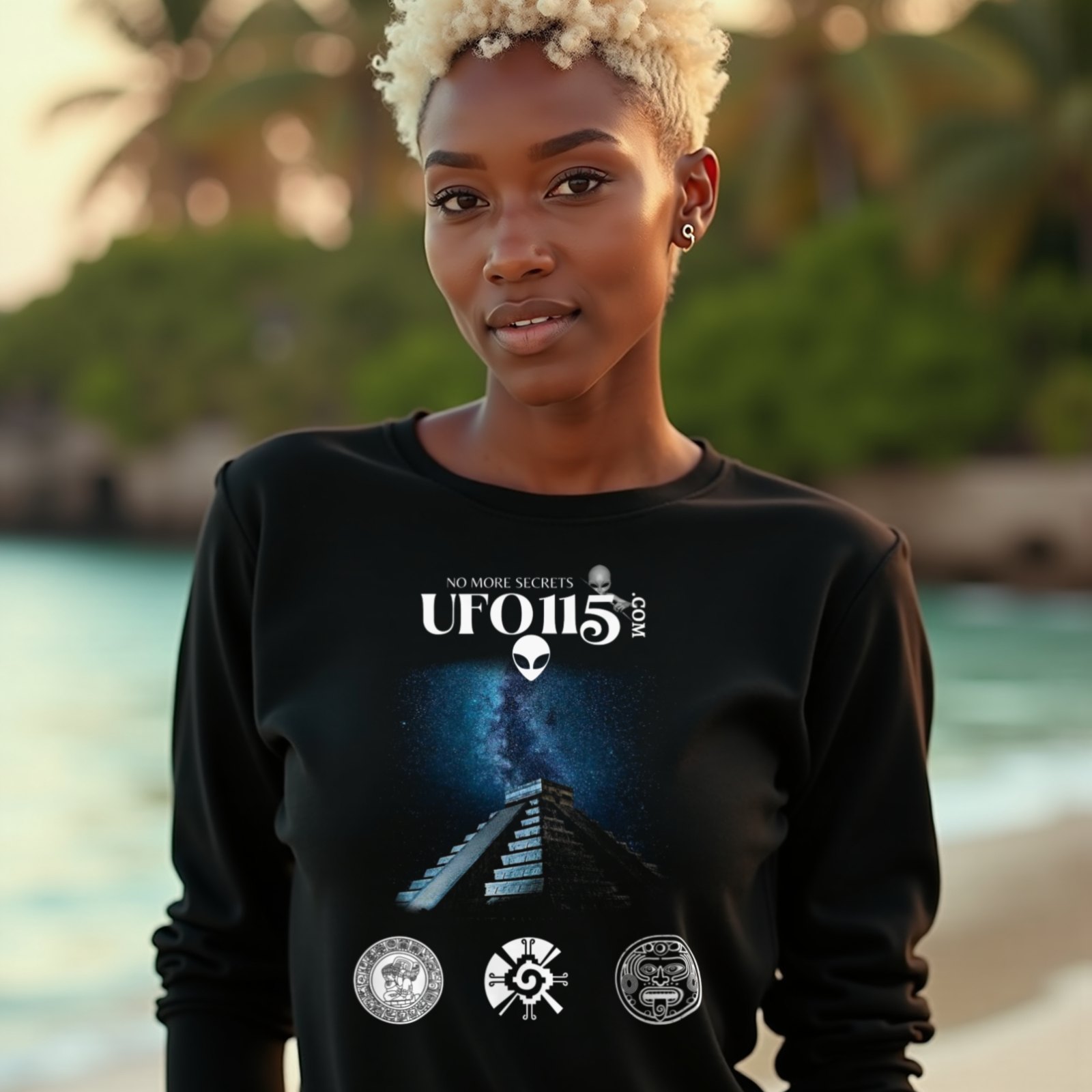 Mayan Pyramid Milky Way long-sleeve T-shirt in Black, worn by a model (on a tropical beach at golden hour). AI-generated image: model and scene are AI-generated; the print is the real artwork.