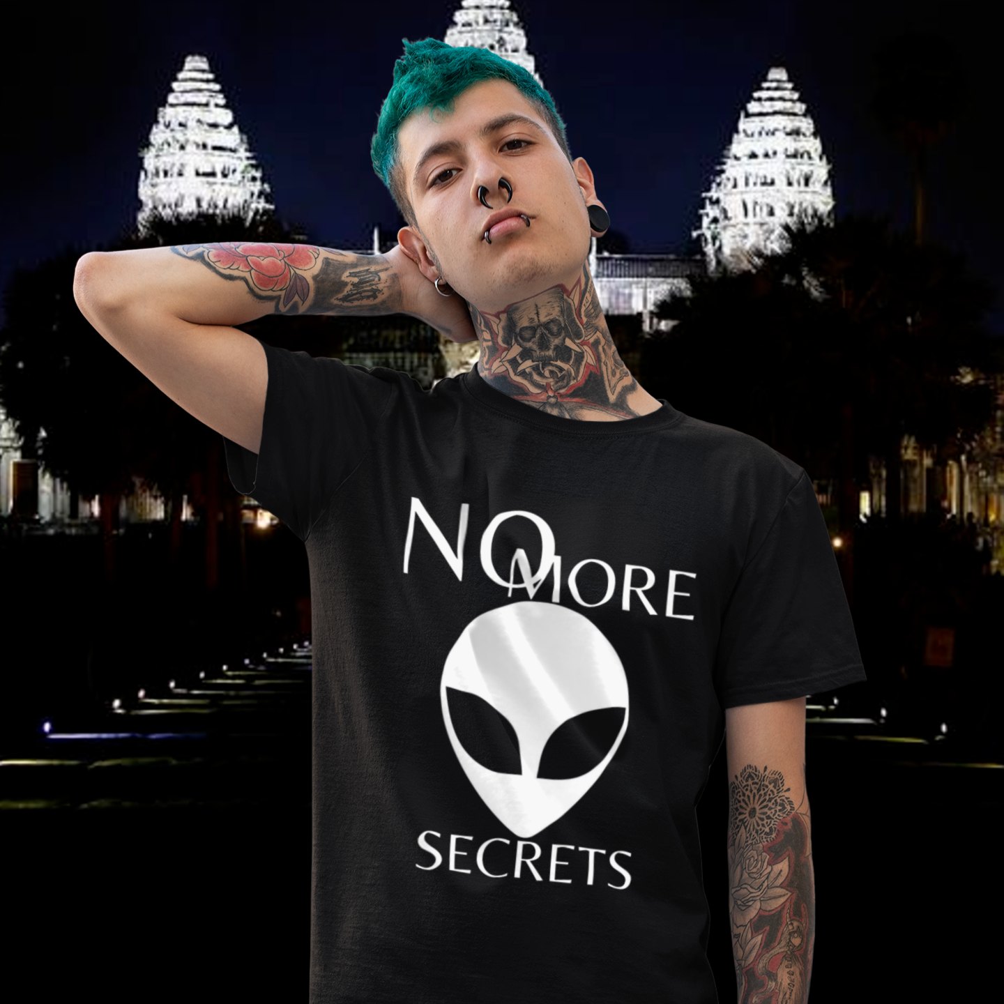 No More Secrets Kapustin Yar T-shirt in Black, front print, worn by a model (temple at night). AI-edited photo: the real print artwork was digitally placed on a model photo.