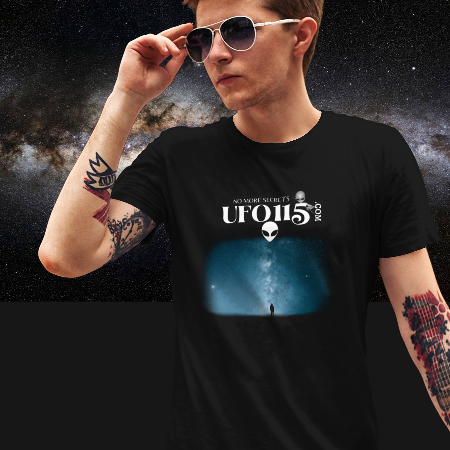 Sky Watcher Blue Solitude T-shirt in Black, front print, worn by a model (Milky Way night). AI-edited photo: the real print artwork was digitally placed on a model photo.