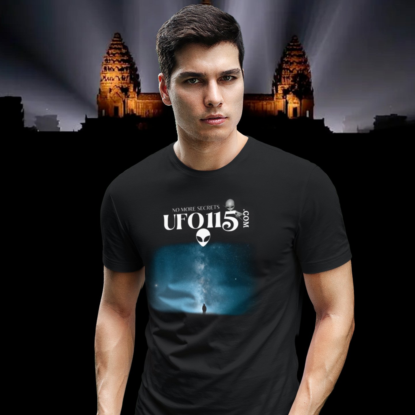Sky Watcher Blue Solitude T-shirt in Black, front print, worn by a model (Angkor temple light beams). AI-edited photo: the real print artwork was digitally placed on a model photo.