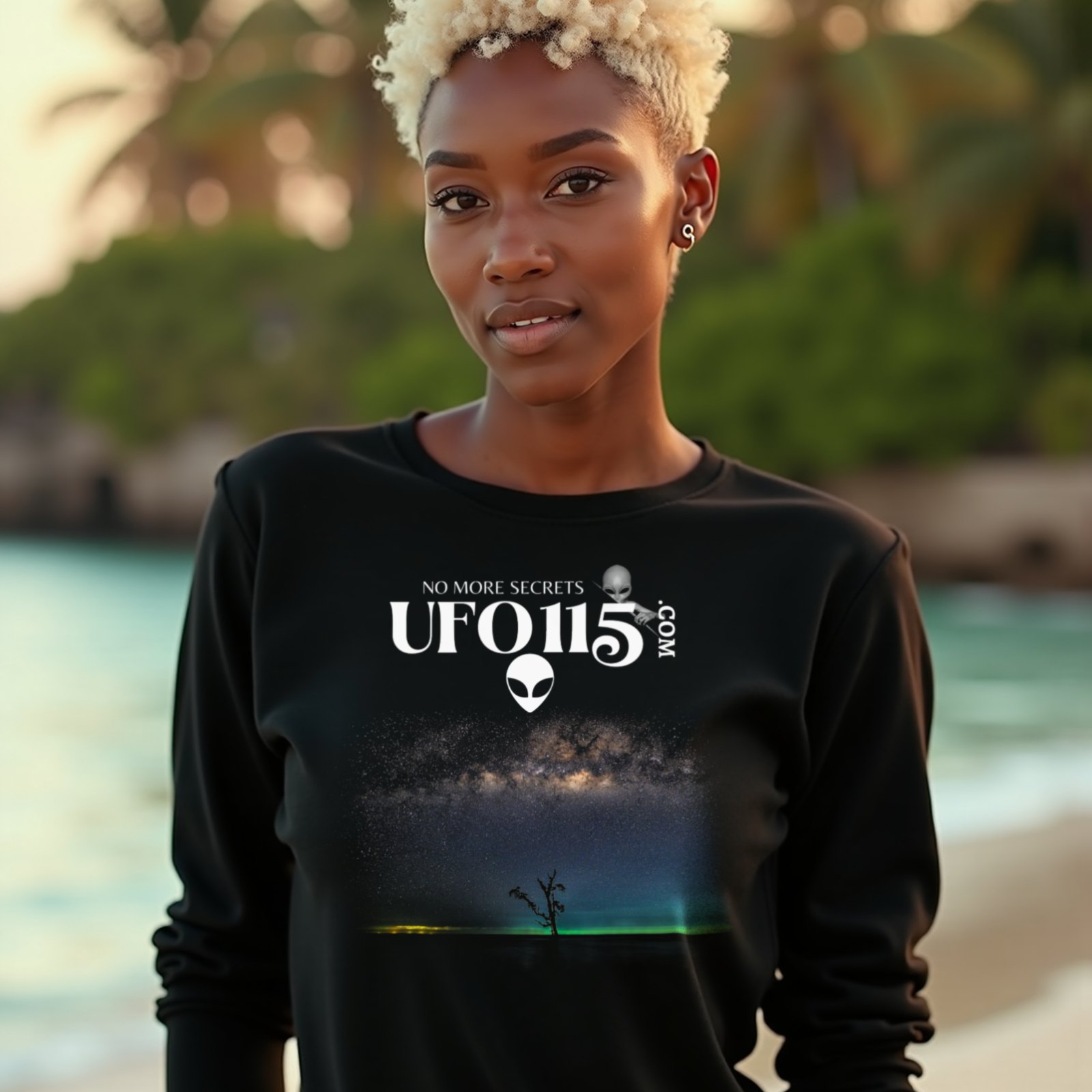 Sky Watcher Glowy Nights long-sleeve T-shirt in Black, worn by a model (on a tropical beach at golden hour). AI-generated image: model and scene are AI-generated; the print is the real artwork.
