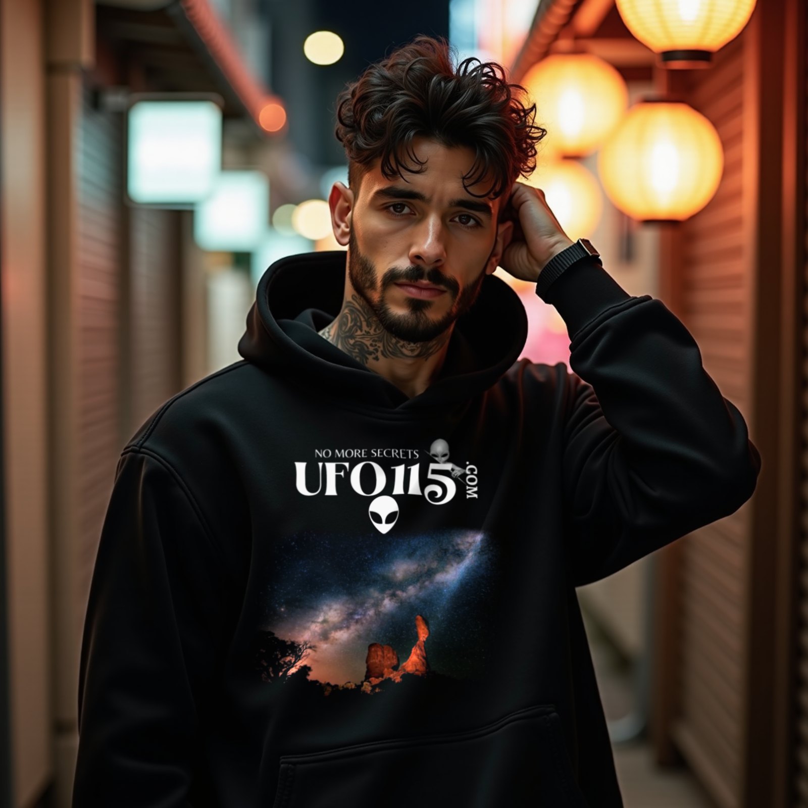 Sky Watcher Milky Way Canyon hoodie in Black, worn by a model (on a narrow Tokyo street at night). AI-generated image: model and scene are AI-generated; the print is the real artwork.