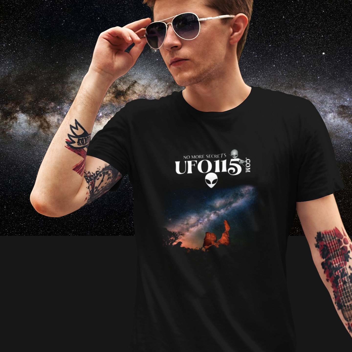 Sky Watcher Milky Way Canyon T-shirt in Black, front print, worn by a model (Milky Way night). AI-edited photo: the real print artwork was digitally placed on a model photo.