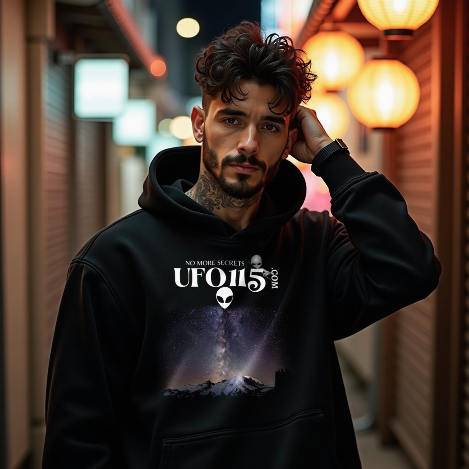 Sky Watcher Mountain Light hoodie in Black, worn by a model (on a narrow Tokyo street at night). AI-generated image: model and scene are AI-generated; the print is the real artwork.