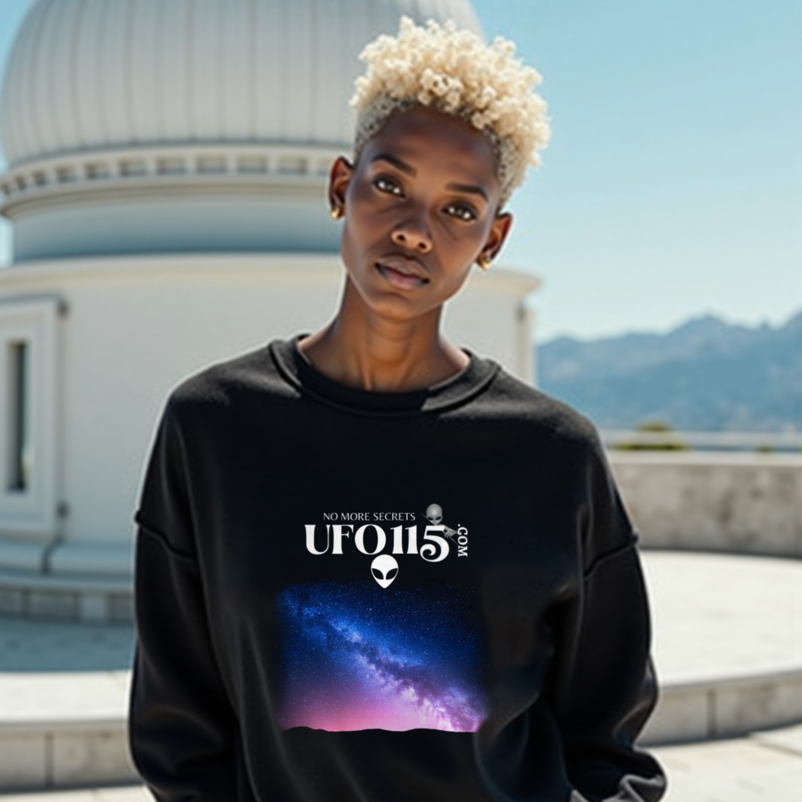 Sky Watcher Pretty in Pink crewneck sweatshirt in Black, worn by a model (on the white stone terrace of a mountain-top observatory on a bright clear day). AI-generated image: model and scene are AI-generated; the print is the real artwork.