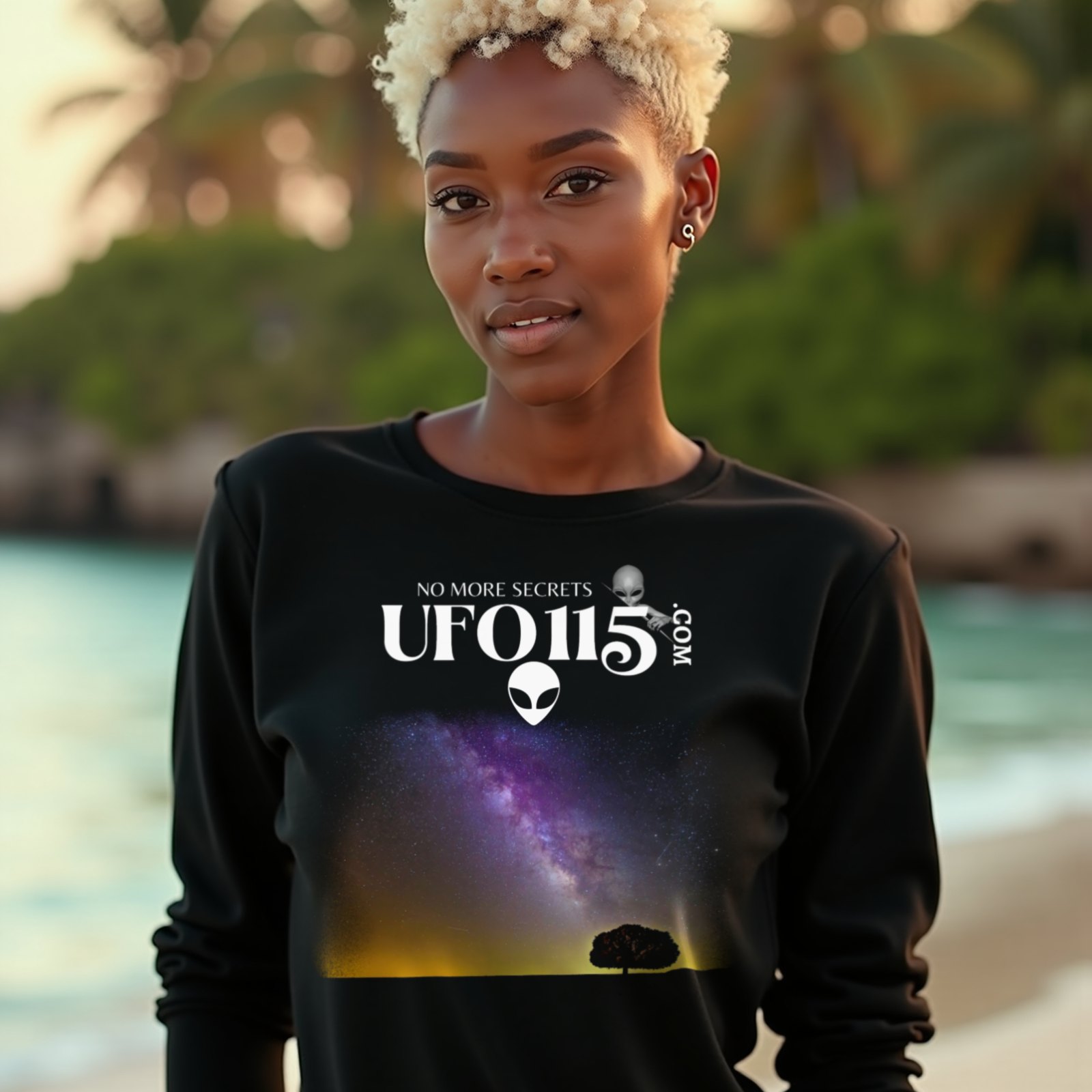 Sky Watcher Purple Star Dust long-sleeve T-shirt in Black, worn by a model (on a tropical beach at golden hour). AI-generated image: model and scene are AI-generated; the print is the real artwork.