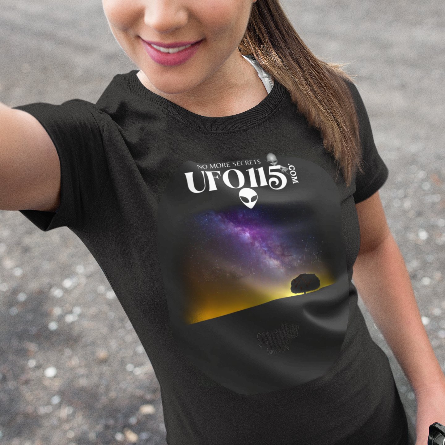 Sky Watcher Purple Star Dust T-shirt in Black, front print, worn by a model (outdoor selfie, day). AI-edited photo: the real print artwork was digitally placed on a model photo.
