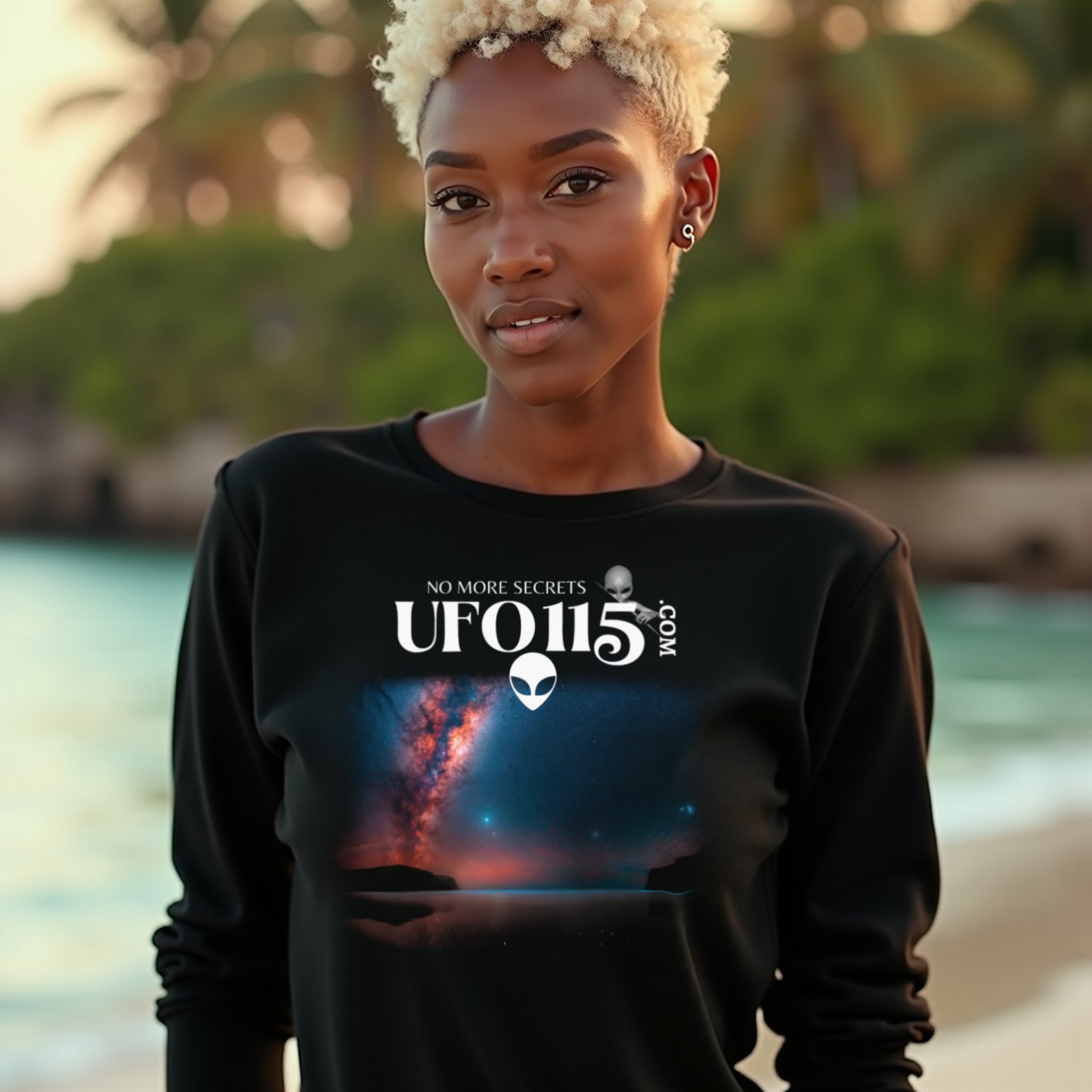 Sky Watcher – Ring of Fire long-sleeve T-shirt in Black, worn by a model (on a tropical beach at golden hour). AI-generated image: model and scene are AI-generated; the print is the real artwork.