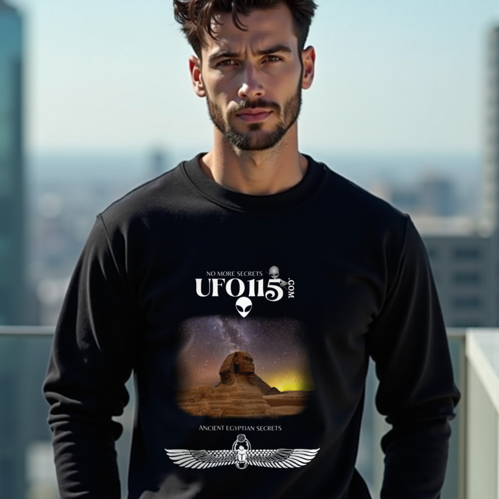 Sphinx and Sky crewneck sweatshirt in Black, worn by a model (on a rooftop terrace above a modern city skyline on a clear day). AI-generated image: model and scene are AI-generated; the print is the real artwork.