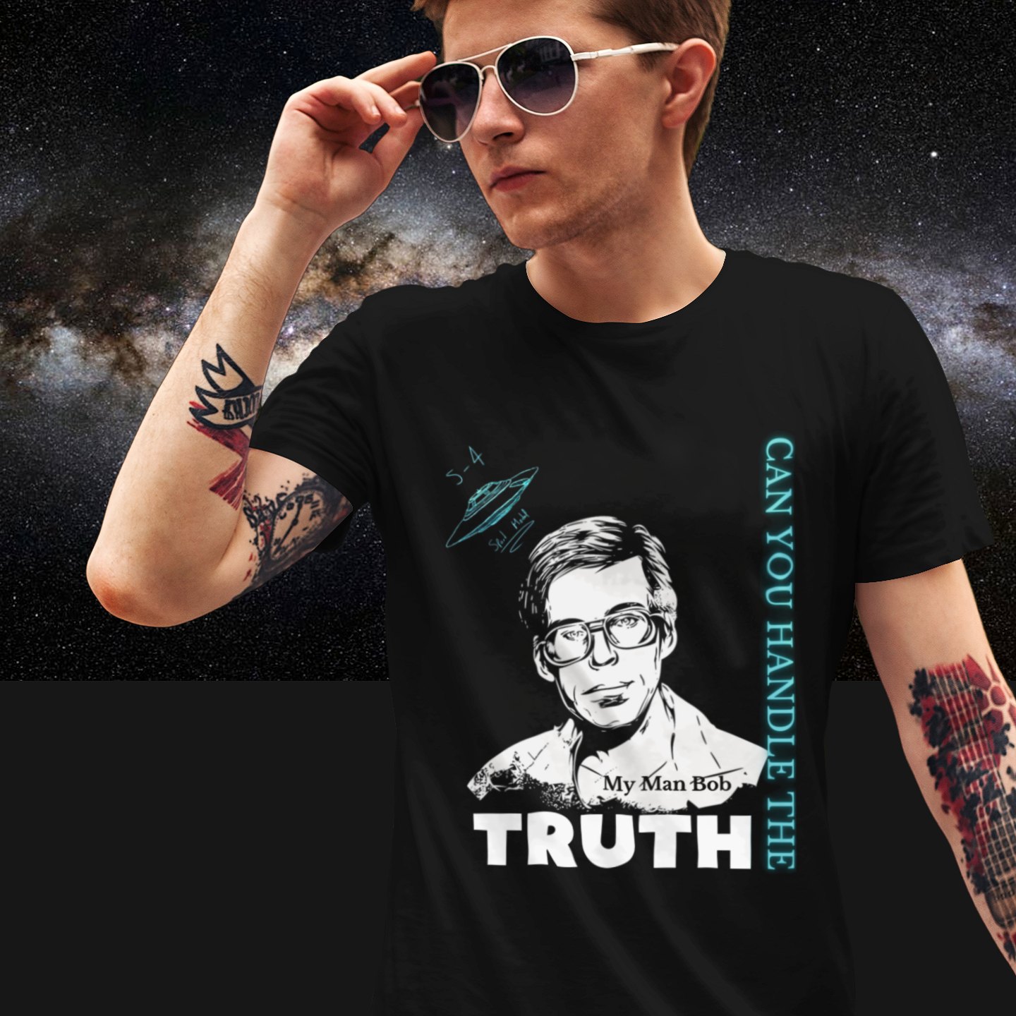 Truth Telling Bob T-shirt in Black, front print, worn by a model (Milky Way night). AI-edited photo: the real print artwork was digitally placed on a model photo.
