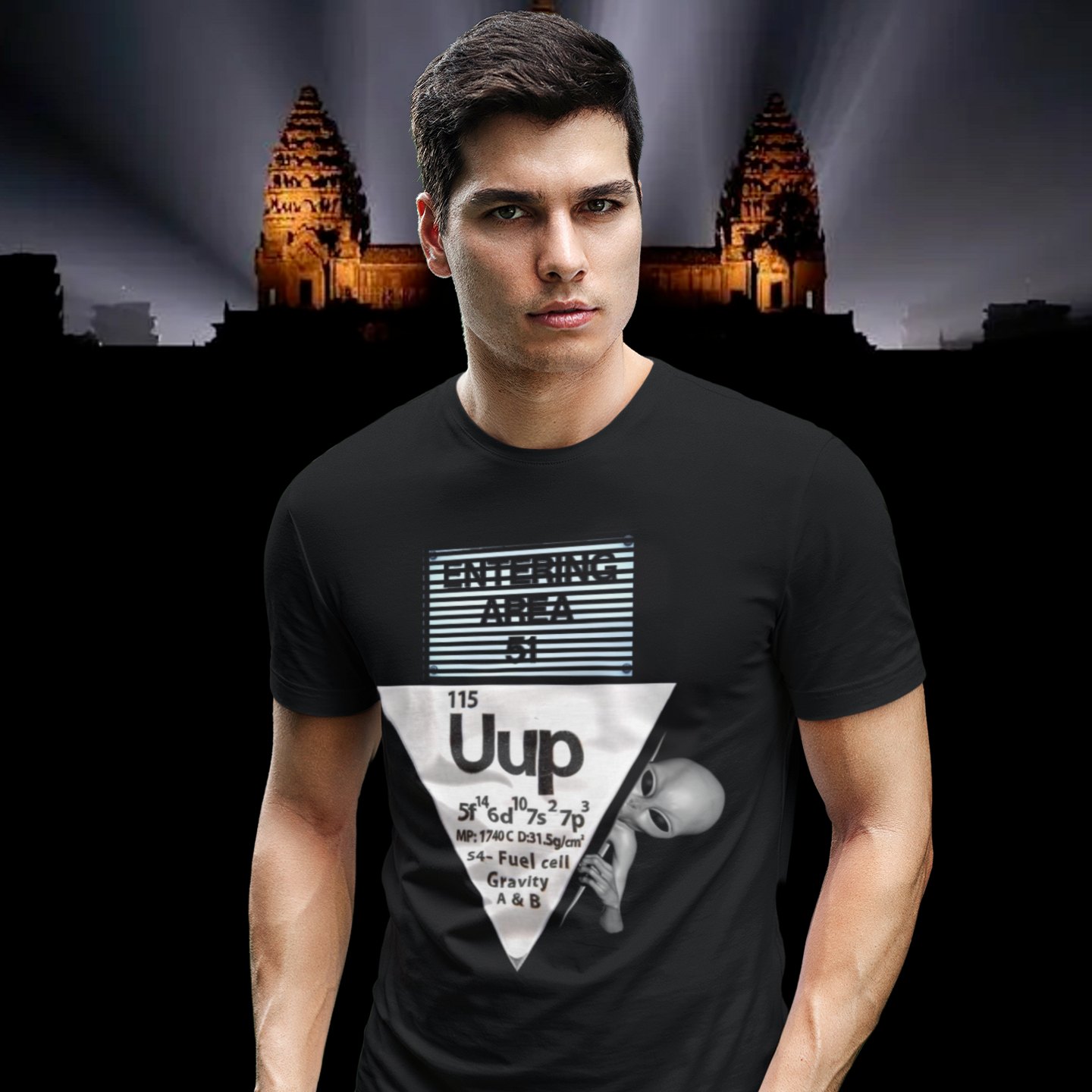 Uup 115 Entering Area 51 T-shirt in Black, front print, worn by a model (Angkor temple light beams). AI-edited photo: the real print artwork was digitally placed on a model photo.