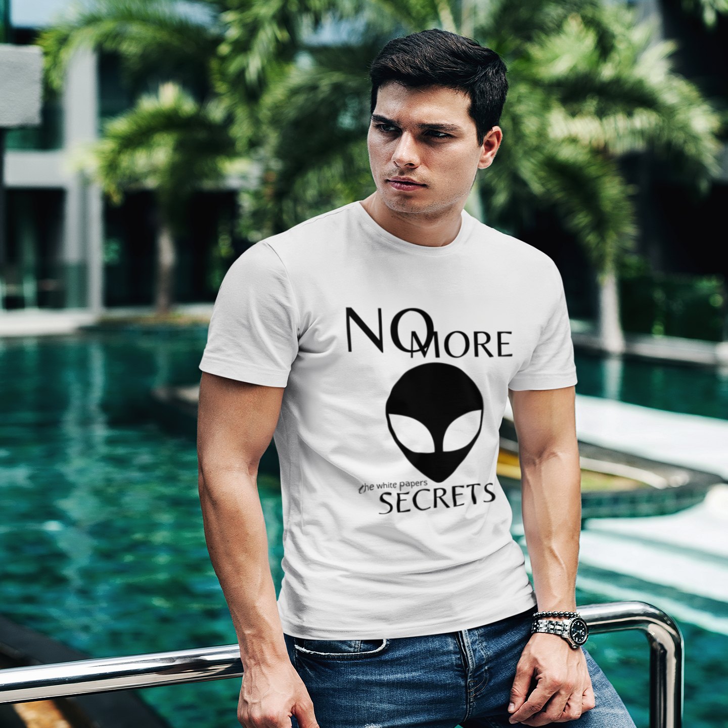 The White Papers My Man Bob T-shirt in White, front print, worn by a model (tropical pool, day). AI-edited photo: the real print artwork was digitally placed on a model photo.