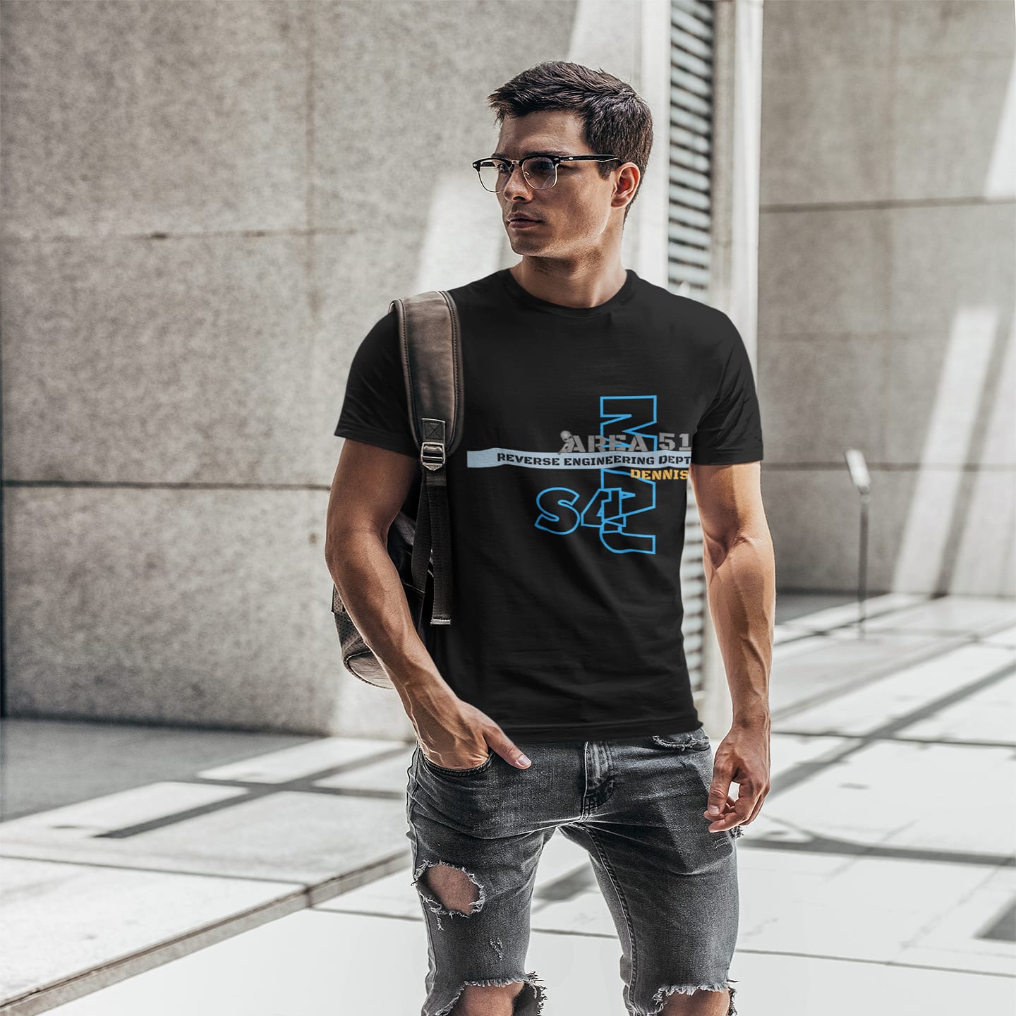 Model wearing the Area 51 Reverse Engineering Dept black T-shirt (front view)