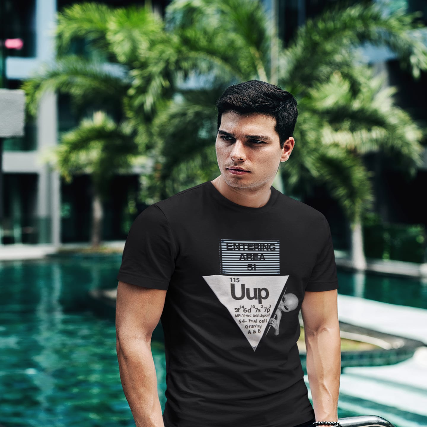 Model wearing the Uup 115 Entering Area 51 black T-shirt (front view)