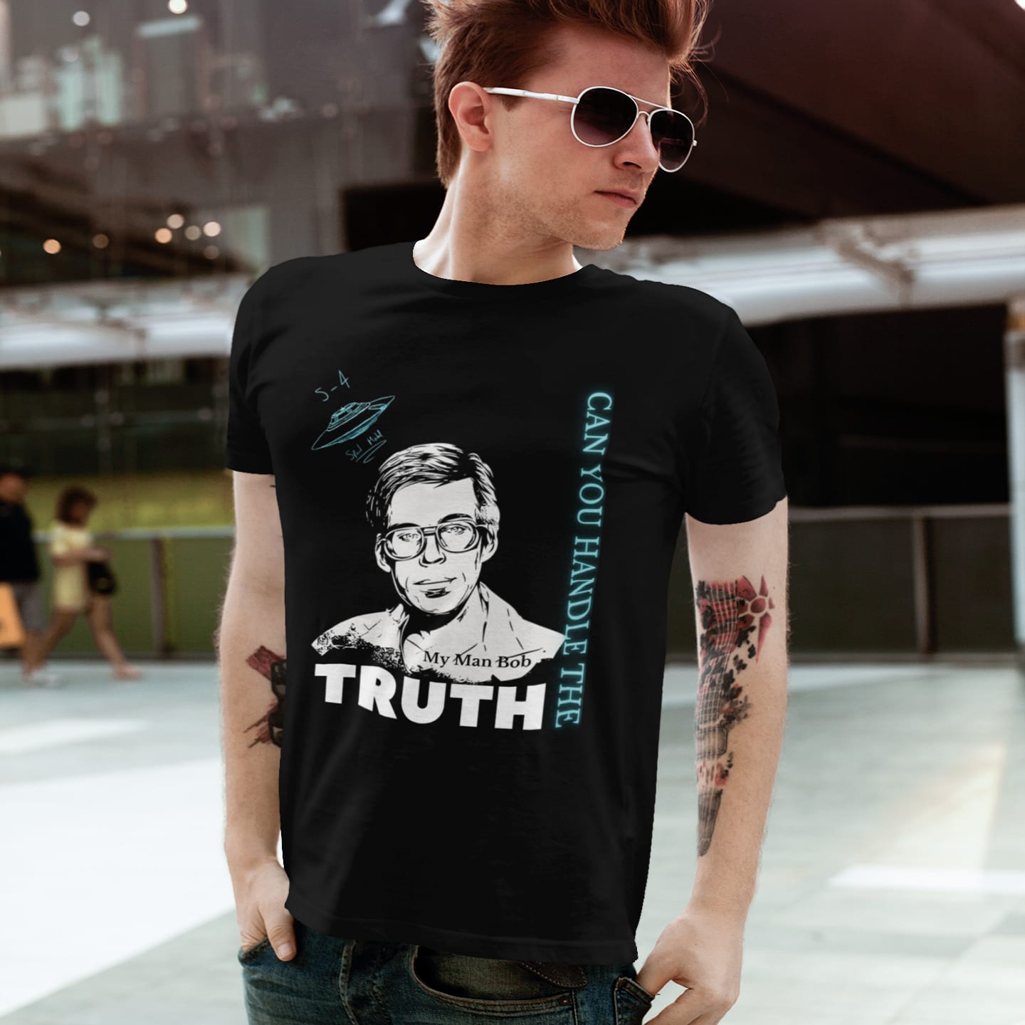 Model wearing the Truth Telling Bob black T-shirt (front view)