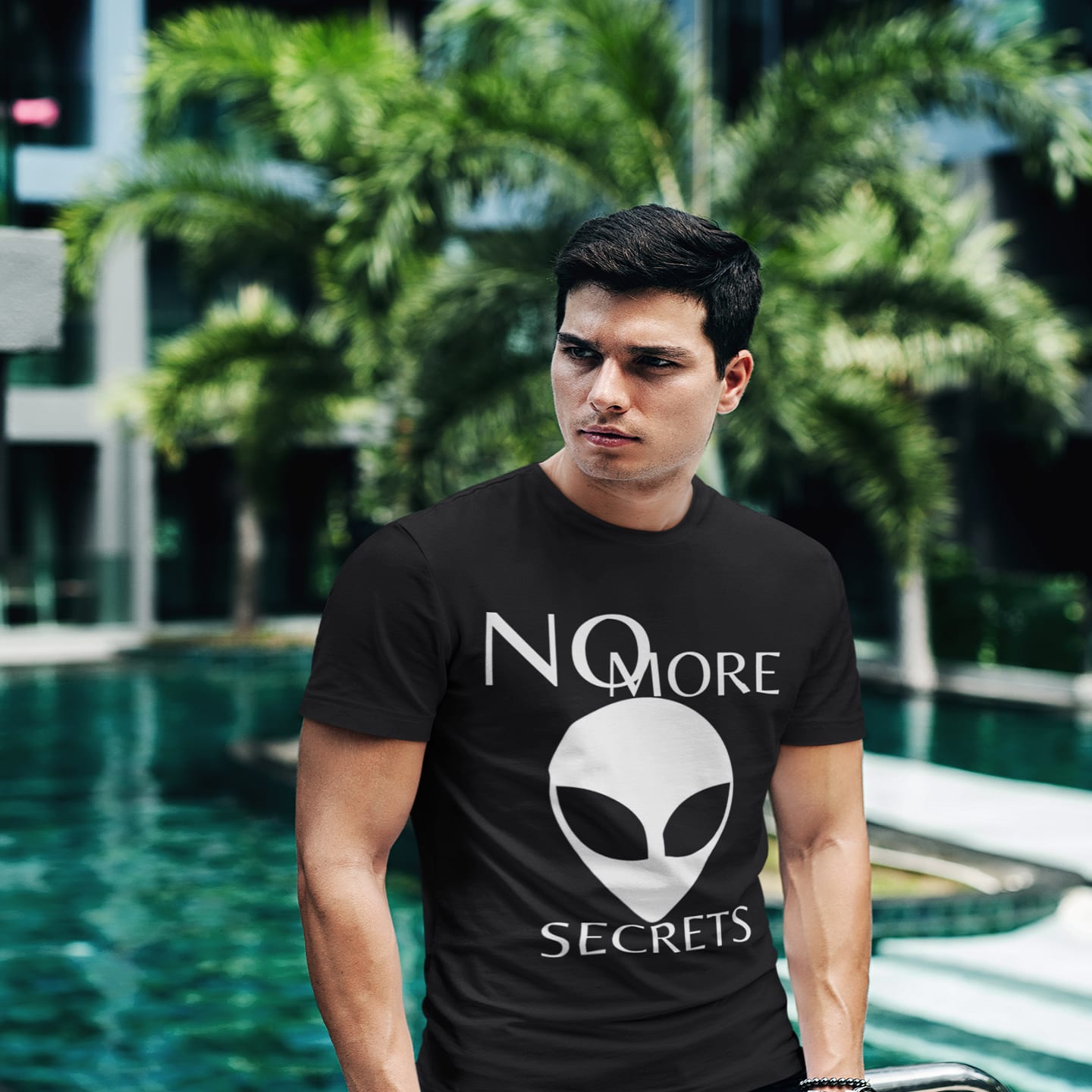 Model wearing the No More Secrets Area 51 black T-shirt (front view)