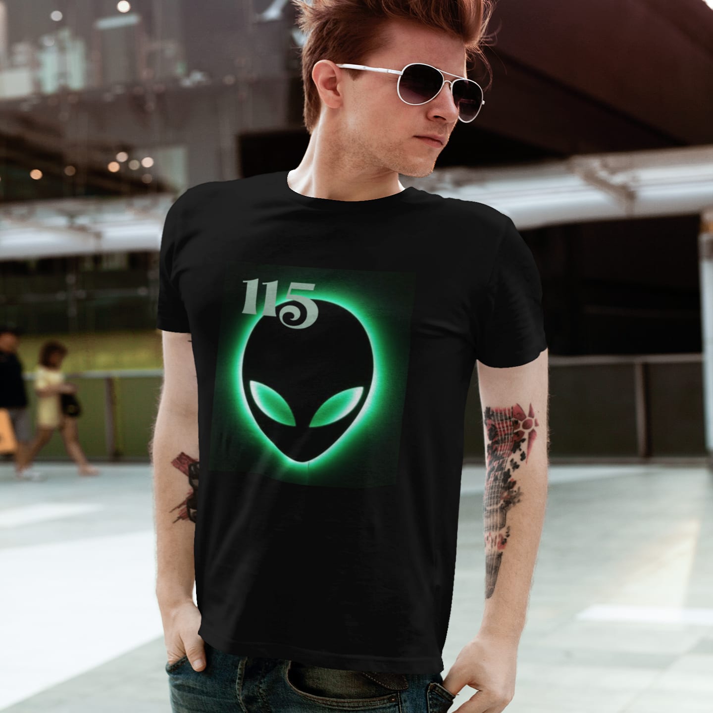 Model wearing the Element 115 Glowing Alien Grey black T-shirt (front view)
